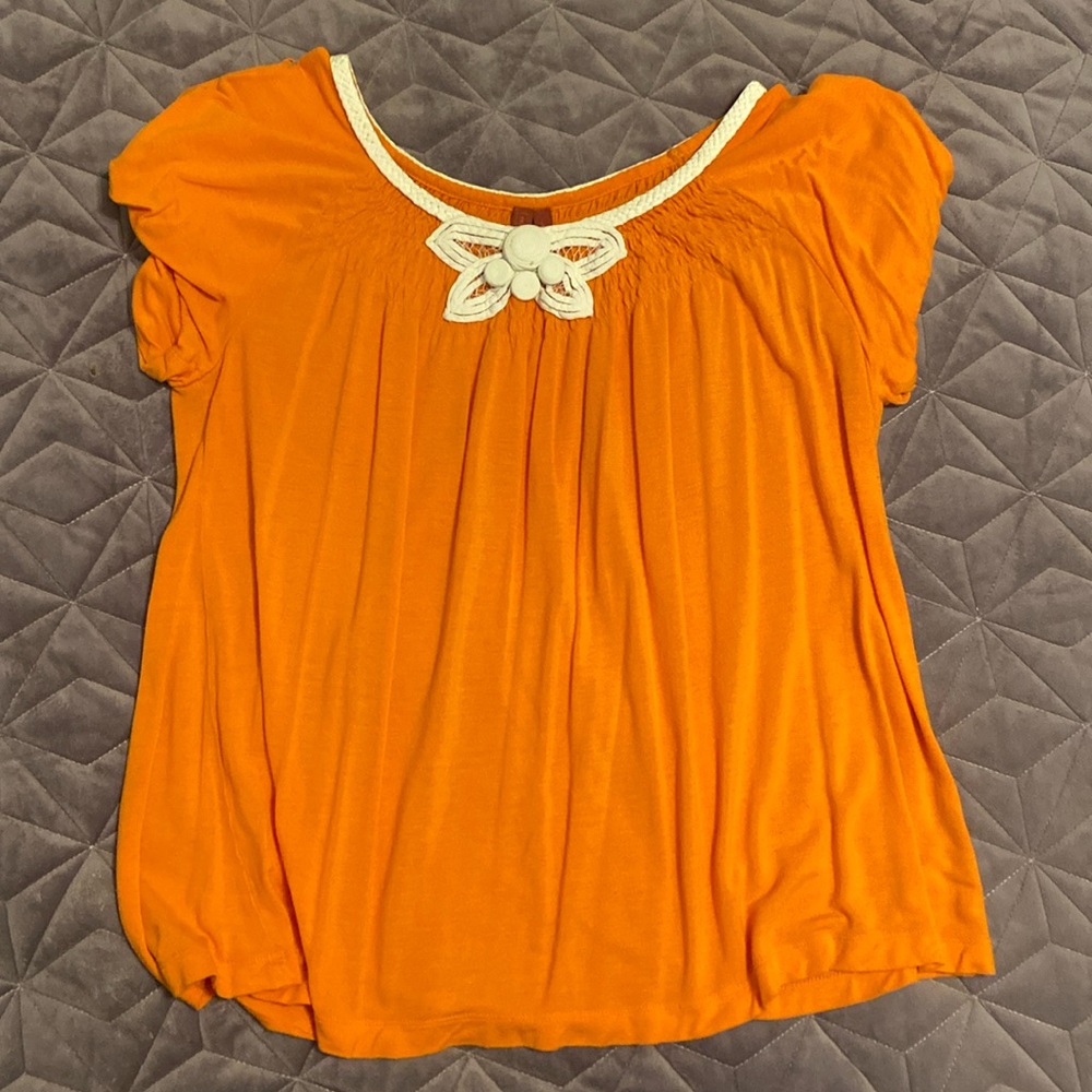 Orange shirt from Anthropologie, size L